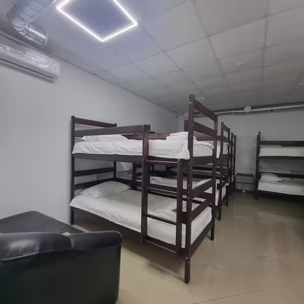 Dormitory room with bunk beds at Aurinia XO Hostel