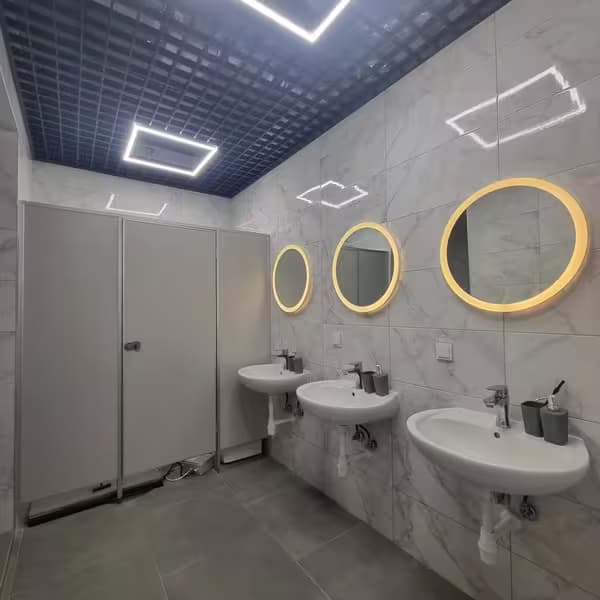 Restroom facilities at Aurinia XO Hostel